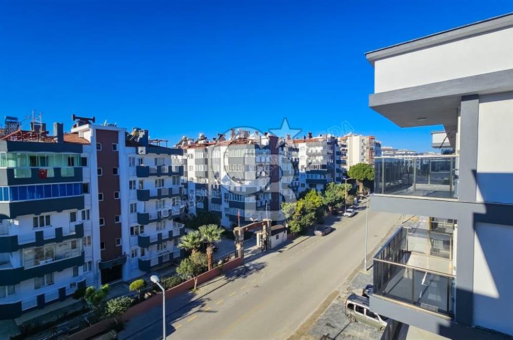Kuşadası İkiçeşmelik te havuzlu sitede satılık 2+1 daire