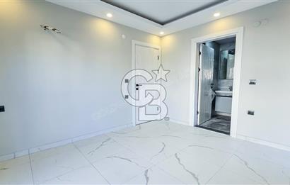 Kuşadası İkiçeşmelik te havuzlu sitede satılık 2+1 daire