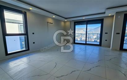 Kuşadası İkiçeşmelik te havuzlu sitede satılık 2+1 daire