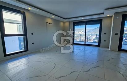 Kuşadası İkiçeşmelik te havuzlu sitede satılık 2+1 daire
