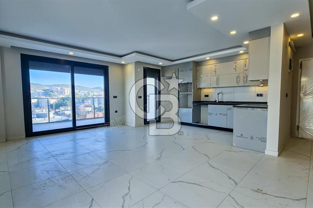 Kuşadası İkiçeşmelik te havuzlu sitede satılık 2+1 daire