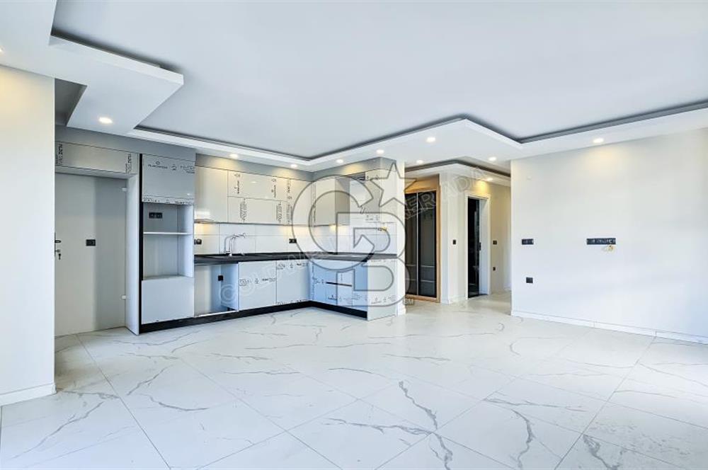 Kuşadası İkiçeşmelik te havuzlu sitede satılık 2+1 daire