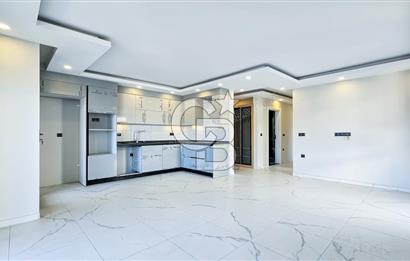 Kuşadası İkiçeşmelik te havuzlu sitede satılık 2+1 daire