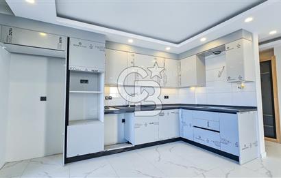 Kuşadası İkiçeşmelik te havuzlu sitede satılık 2+1 daire