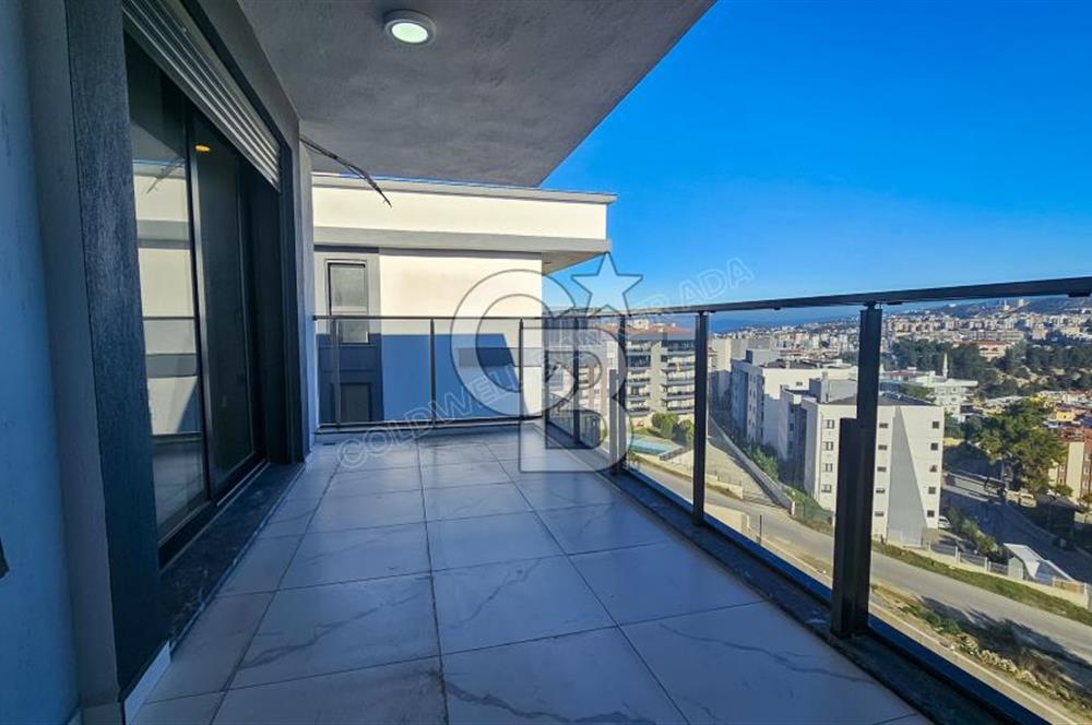 Kuşadası İkiçeşmelik te havuzlu sitede satılık 2+1 daire
