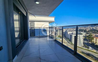 Kuşadası İkiçeşmelik te havuzlu sitede satılık 2+1 daire