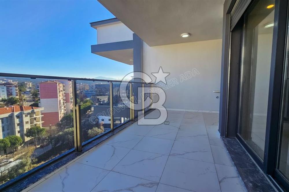 Kuşadası İkiçeşmelik te havuzlu sitede satılık 2+1 daire
