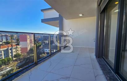 Kuşadası İkiçeşmelik te havuzlu sitede satılık 2+1 daire