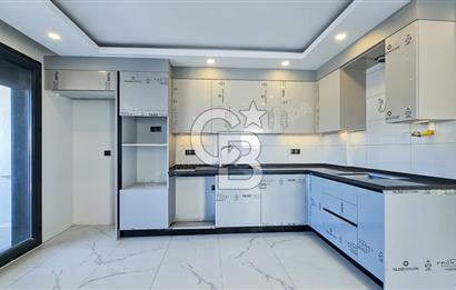 Kuşadası İkiçeşmelik te havuzlu sitede satılık 2+1 daire