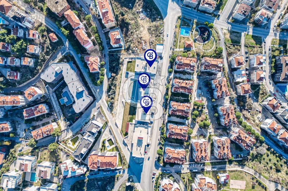 Kuşadası İkiçeşmelik te havuzlu sitede satılık 2+1 daire
