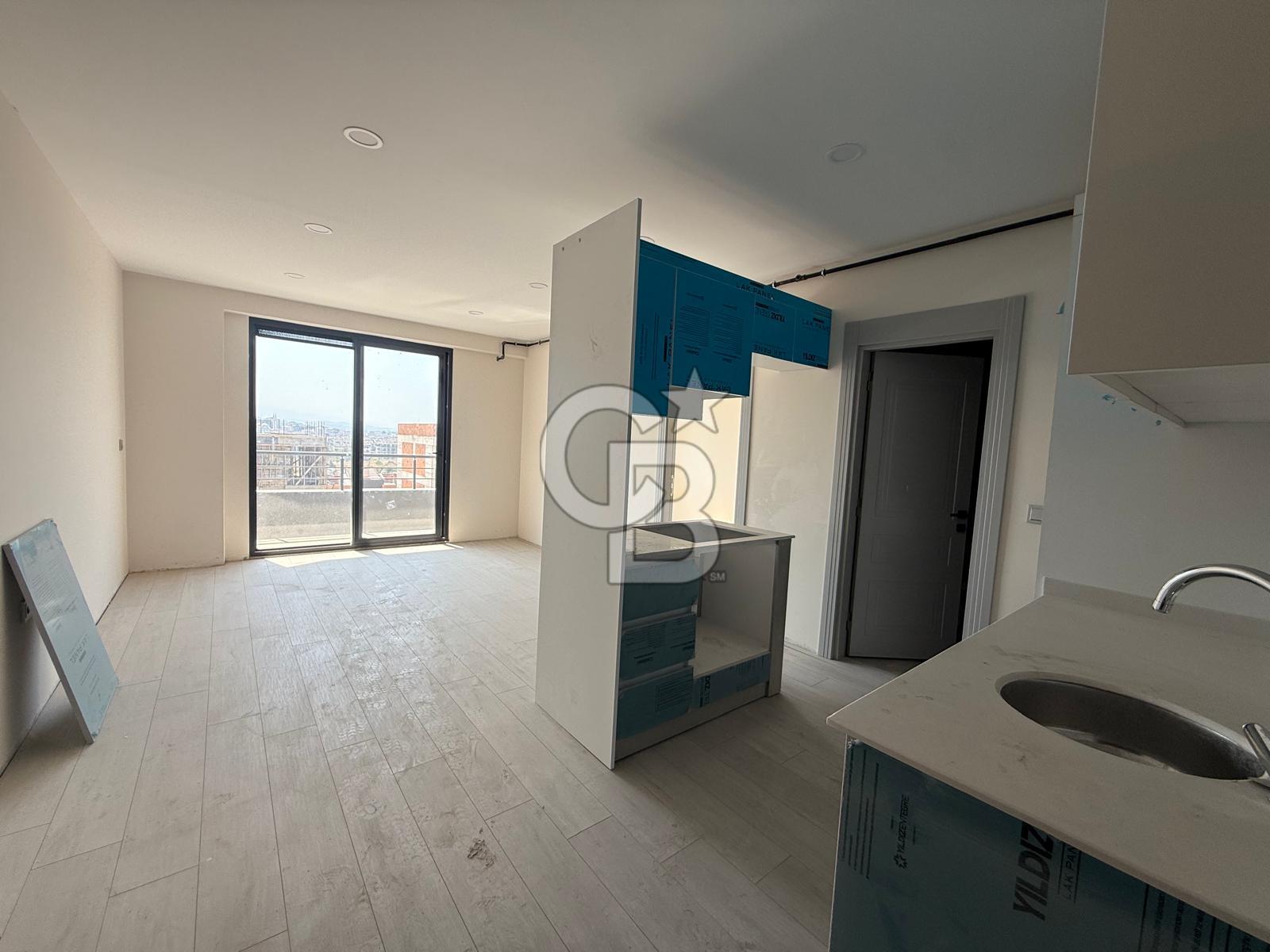 ÇİFTLİKKÖY ÇİFTLİK MAHALLESİ ŞURA SİTESİ’NDE SATILIK 1+1 ARA KAT DAİRE