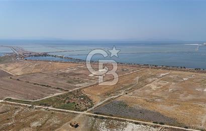İzmir Menemen Süzbeyli' de 53 Dönüm Yol Cepheli Satılık Arazi