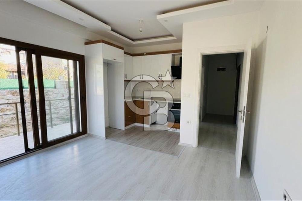 Foça Yenibağarası Mah. Kiralık 2+1 Bahçe Katı Daire