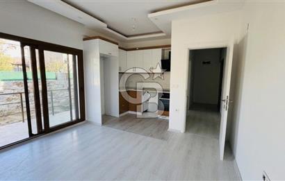 Foça Yenibağarası Mah. Kiralık 2+1 Bahçe Katı Daire