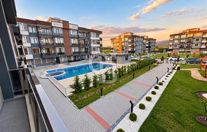 Ayvalık Altınova'da Havuzlu Site İçerisinde 1+1 Satılık Daire