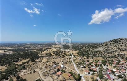 EZİNE KAYACIKTA BOZCAADA MANZARALI 1228 M2 AVLULU AĞİL NİTELİĞİNDE YAPI İZNİ ALINABİLİR FIRSAT ARAZİ