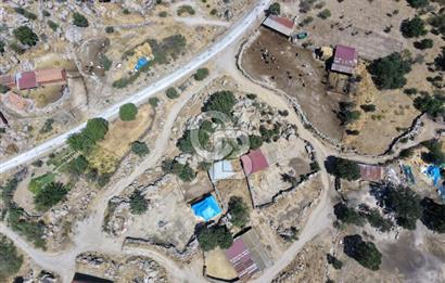 EZİNE KAYACIKTA BOZCAADA MANZARALI 1228 M2 AVLULU AĞİL NİTELİĞİNDE YAPI İZNİ ALINABİLİR FIRSAT ARAZİ
