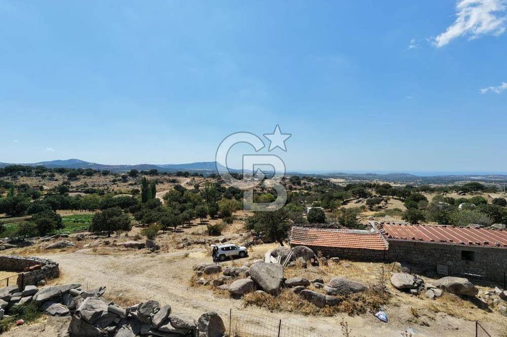 EZİNE KAYACIKTA BOZCAADA MANZARALI 1228 M2 AVLULU AĞİL NİTELİĞİNDE YAPI İZNİ ALINABİLİR FIRSAT ARAZİ