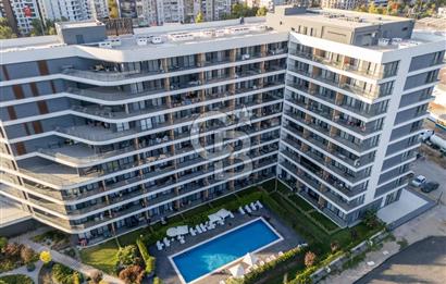 BORNOVA TRADE MARK Pİ SATILIK 1+1 LÜKS EŞYALI HAVUZ CEPHE