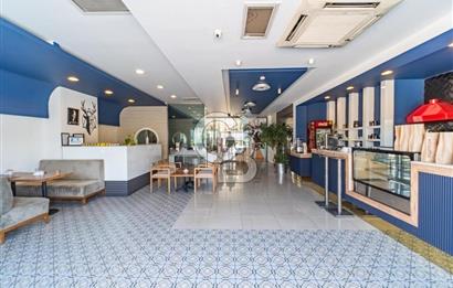 GAZİEMİR AKÇAY CADDESİ CEPHELİ SATILIK 1000 m2 TİCARİ MÜLK.