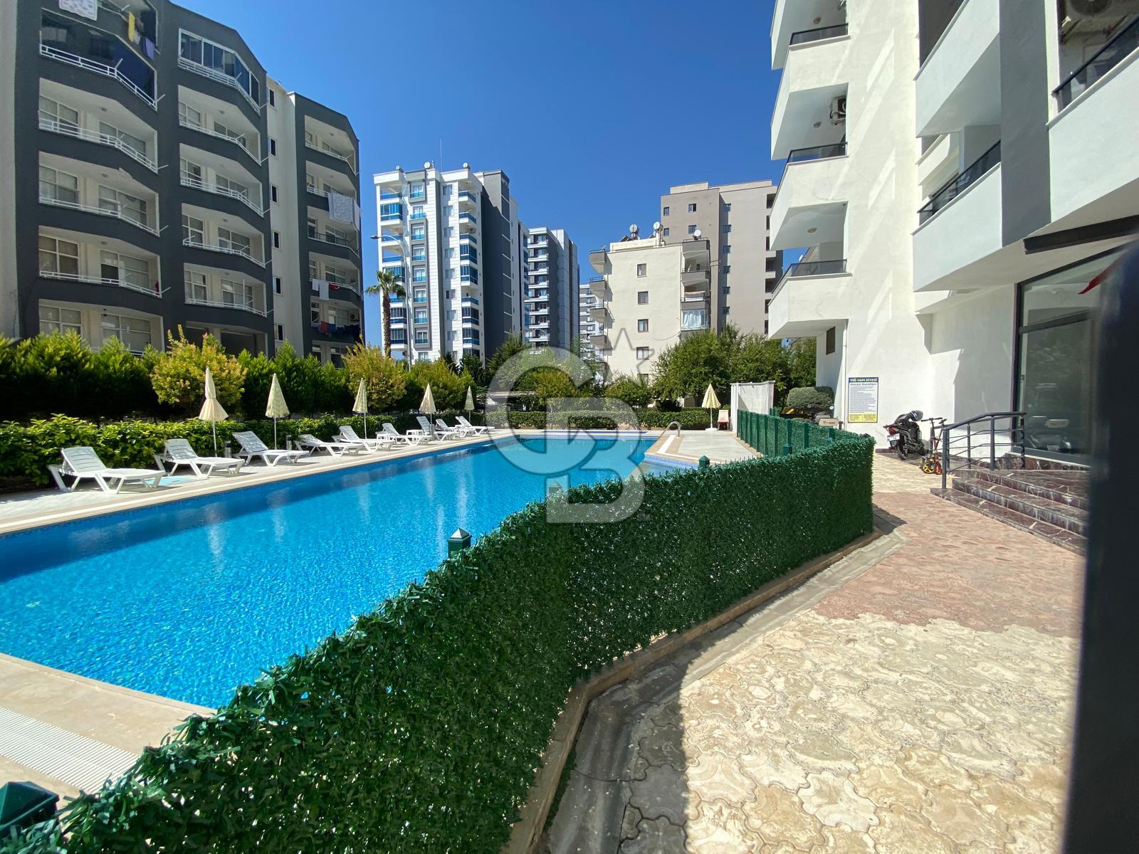 MERSİN ERDEMLİ HAVUZLU SİTEDE DENİZE 400 M. 1+1 SATILIK DAİRE