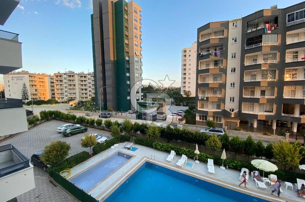 MERSİN ERDEMLİ HAVUZLU SİTEDE DENİZE 400 M. 1+1 SATILIK DAİRE