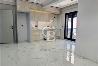 Kuşadası Merkezde Sıfır Yerden Isıtmalı 2+1 Lüks Daire - 4 - 373457