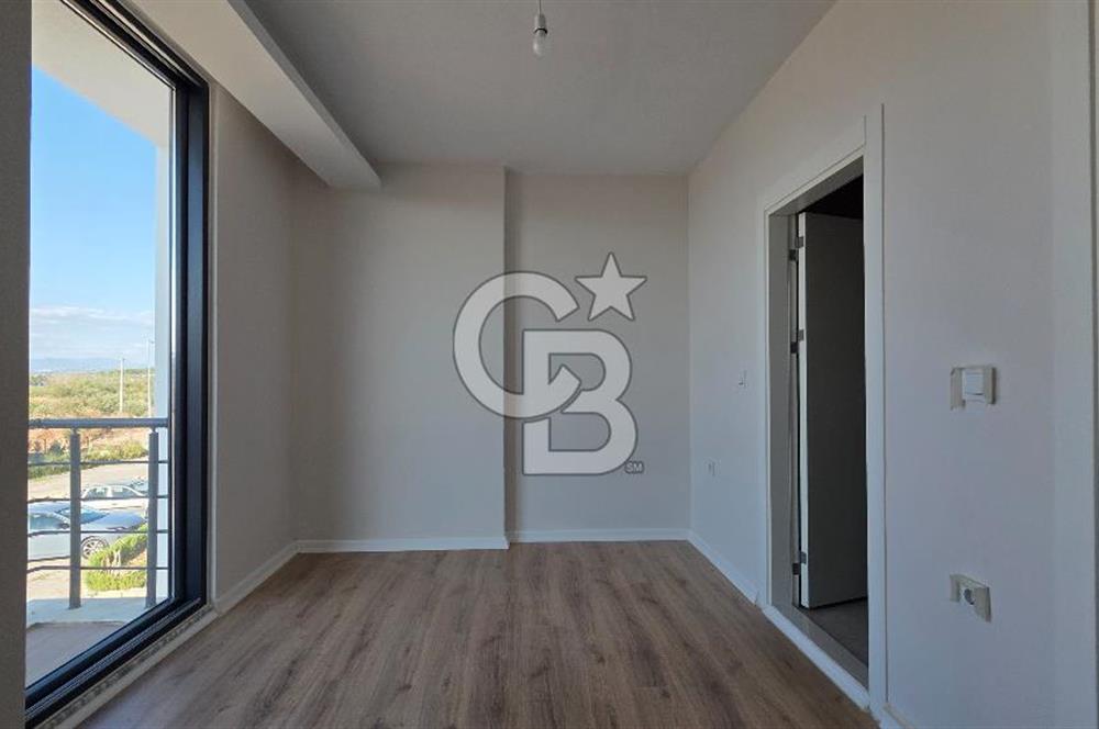 Gömeç Keremköy’de Denize sıfır havuzlu sitede satılık 3+1 villa 