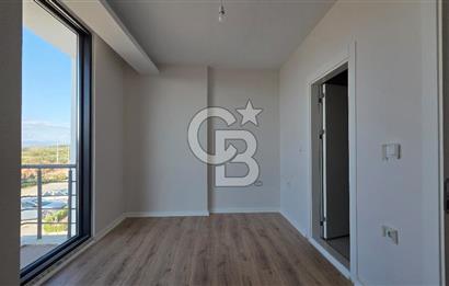 Gömeç Keremköy’de Denize sıfır havuzlu sitede satılık 3+1 villa 