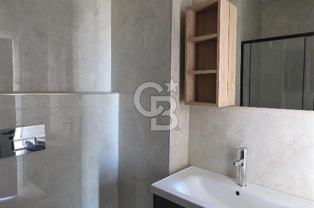 Gömeç Keremköy’de Denize sıfır havuzlu sitede satılık 3+1 villa 