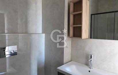 Gömeç Keremköy’de Denize sıfır havuzlu sitede satılık 3+1 villa 