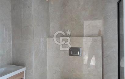 Gömeç Keremköy’de Denize sıfır havuzlu sitede satılık 3+1 villa 
