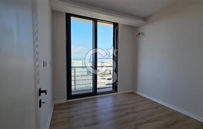 Gömeç Keremköy’de Denize sıfır havuzlu sitede satılık 3+1 villa 