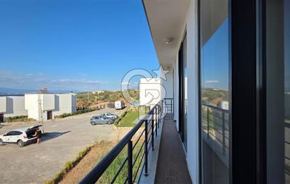 Gömeç Keremköy’de Denize sıfır havuzlu sitede satılık 3+1 villa 