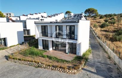 Gömeç Keremköy’de Denize sıfır havuzlu sitede satılık 3+1 villa 