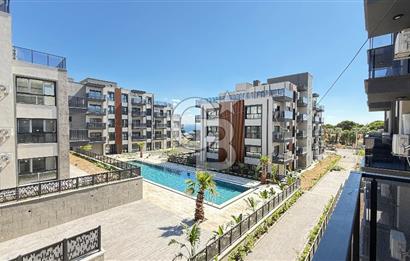 1+1 Flat for Sale with Sea View and Pool in Candarli