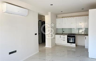 1+1 Flat for Sale with Sea View and Pool in Candarli