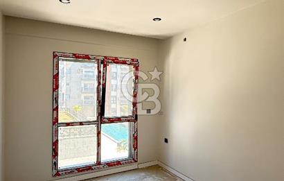 1+1 Flat for Sale with Sea View and Pool in Candarli