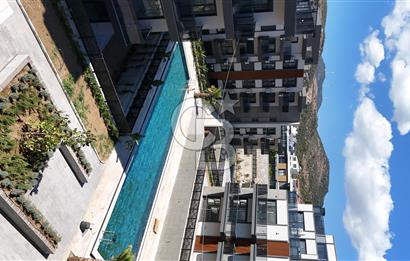 1+1 Flat for Sale with Sea View and Pool in Candarli
