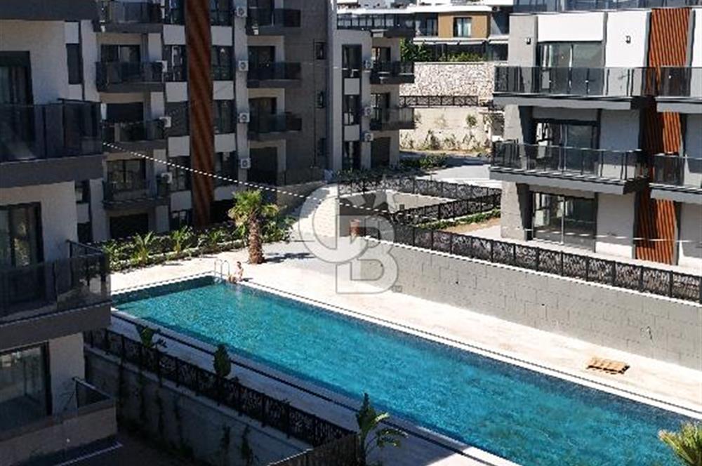 1+1 Flat for Sale with Sea View and Pool in Candarli