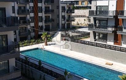 1+1 Flat for Sale with Sea View and Pool in Candarli