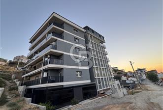 İSKANLI | OTURUM BAŞLAMIŞ | ULUKENT MERKEZ’DE SIFIR 1+1 DAİRE - 1 - 373907