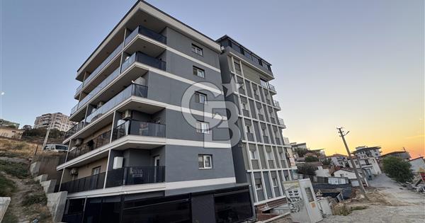 İSKANLI | OTURUM BAŞLAMIŞ | ULUKENT MERKEZ’DE SIFIR 1+1 DAİRE - 373907