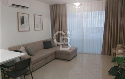 KKTC GİRNE MERKEZDE LES AMBASSADEURS HOTELE VE DENİZE YAKIN SATILIK 1+1 EŞYALI DAİRE