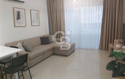 KKTC GİRNE MERKEZDE LES AMBASSADEURS HOTELE VE DENİZE YAKIN SATILIK 1+1 EŞYALI DAİRE