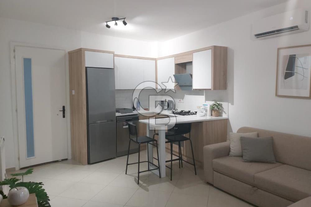 KKTC GİRNE MERKEZDE LES AMBASSADEURS HOTELE VE DENİZE YAKIN SATILIK 1+1 EŞYALI DAİRE