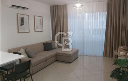 KKTC GİRNE MERKEZDE LES AMBASSADEURS HOTELE VE DENİZE YAKIN SATILIK 1+1 EŞYALI DAİRE