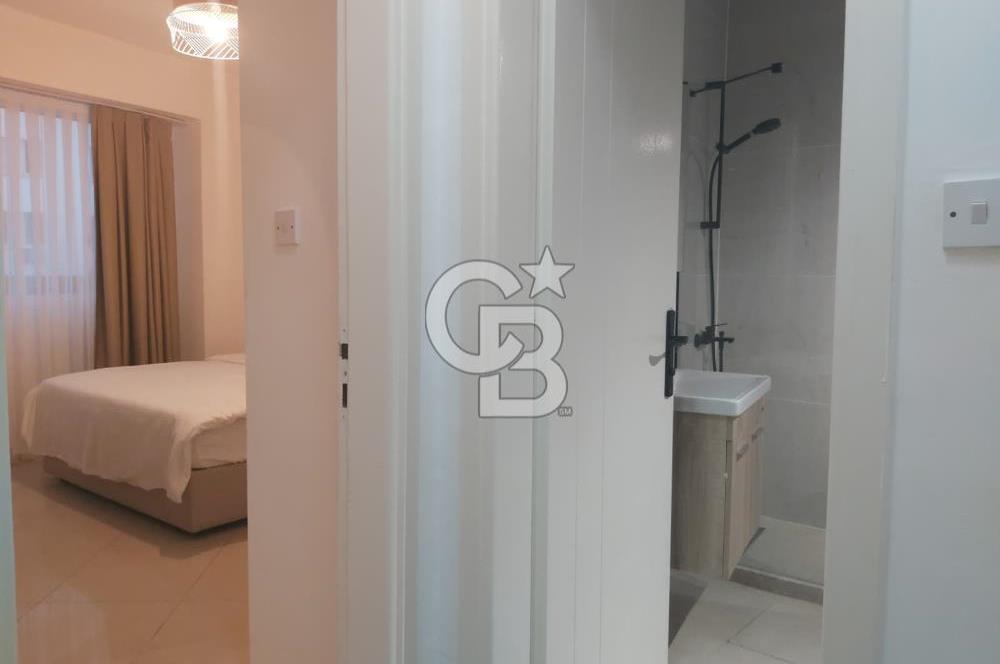 KKTC GİRNE MERKEZDE LES AMBASSADEURS HOTELE VE DENİZE YAKIN SATILIK 1+1 EŞYALI DAİRE