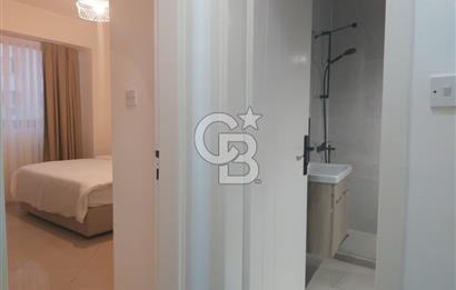 KKTC GİRNE MERKEZDE LES AMBASSADEURS HOTELE VE DENİZE YAKIN SATILIK 1+1 EŞYALI DAİRE
