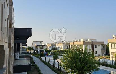 KKTC GİRNE ALSANCAKTA SİTE İÇERİSİNDE ANAYOLA VE DENİZE YAKIN SATILIK YENİ 2+1 DAİRELER